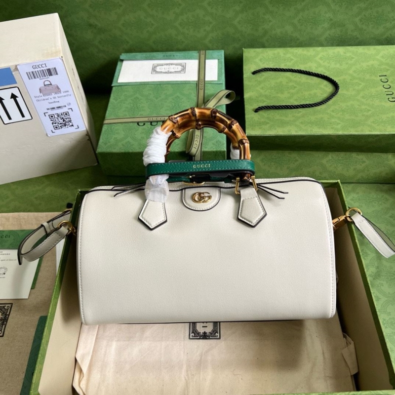 G*u*i top handle bags